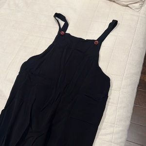 Black cloth jumpsuit/overalls size L